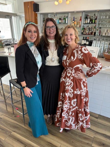 Jenny Guthrie, host Nancy Moore and a guest at the bar of The Vault Restaurant
